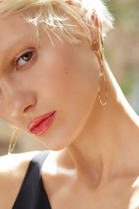 ali grace jewelry sustainable jewelry design handmade in nyc statement gold hoop earrings gold ear cuff model nora vai apm models