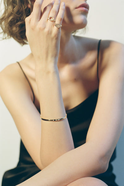 ali grace jewelry sustainable jewelry ethical diamond recycled 14k yellow gold gold diamond pinky ring gold bracelet like cartier bracelet