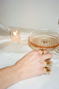 ali grace jewelry ali grace handmade sustainable jewelry ethical fashion design nyc new york city alternative wedding jewelry bridal jewelry 35mm film editorial photoshoot romance love champagne lipstick hoop earrings statement earrings custom charm necklace
