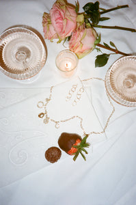 ali grace jewelry ali grace handmade sustainable jewelry ethical fashion design nyc new york city alternative wedding jewelry bridal jewelry 35mm film editorial photoshoot romance love champagne lipstick hoop earrings statement earrings custom charm necklace chocolate strawberries candlelit dinner