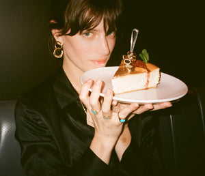 ali grace jewelry ali grace cheesecake sel rrose new york city handmade jewelry nyc sustainable fashion ethical design signet ring peridot bubble ring cocktail party jewelry custom charm necklace moon charm burger fries happy hour new york city lower east side les cheesecake dessert