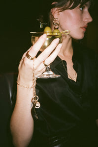 ali grace jewelry ali grace cheesecake sel rrose new york city handmade jewelry nyc sustainable fashion ethical design signet ring peridot bubble ring cocktail party jewelry custom charm necklace moon charm